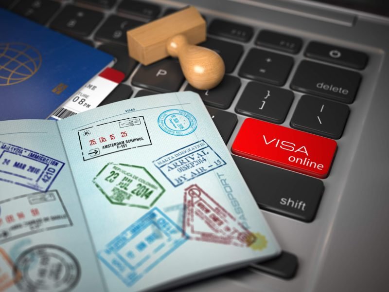 visa-online-application-concept-open-passport-wit-2023-11-27-05-04-44-utc